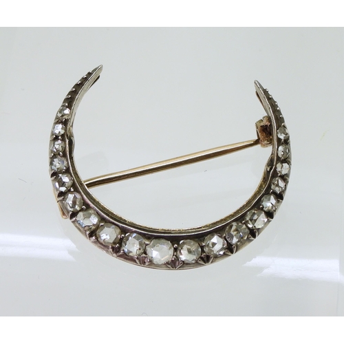 2857 - A DIAMOND CRESCENT MOONset with estimated approximately 0.20cts of rose cut diamonds to the yellow a... 