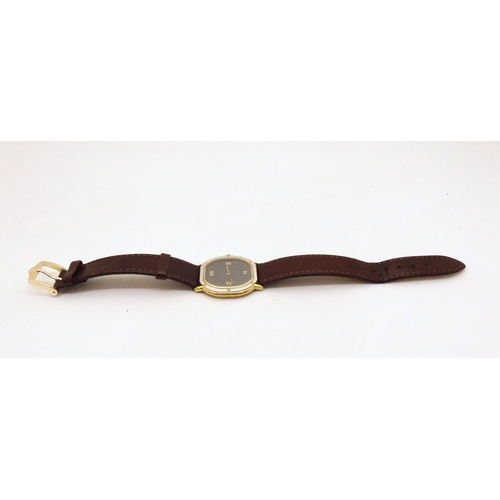 2901 - AN 18CT GOLD EBEL QUARTZ With bi colour gold case, grey dial with gold dot and Roman numerals, with ... 