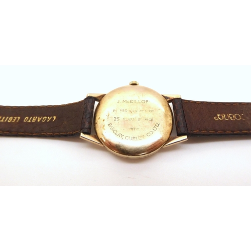 2903 - A 9CT GOLD TUDOR OYSTER WATCHwith silvered dial, Rose logo, gold coloured Arabic and baton numerals ... 