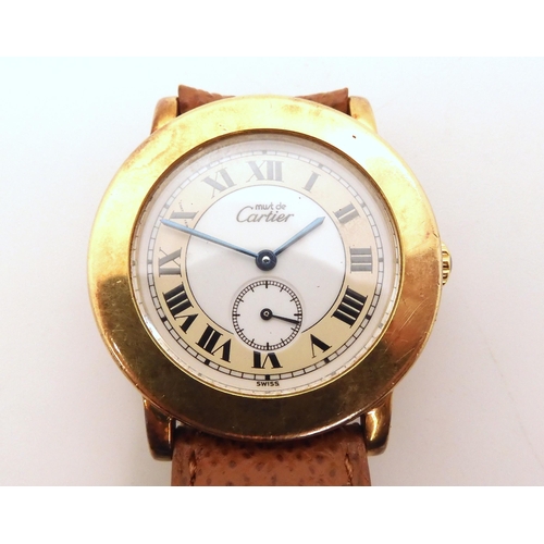 2904 - A MUST DE CARTIER WATCHthe gold plated case with cream and white dial with subsidiary seconds dial b... 