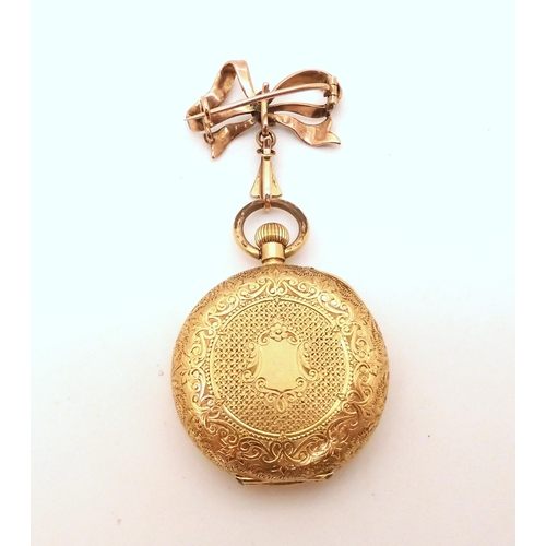 2912 - A LADIES FOB WATCHthe open face fob watch is 18ct gold, with gold coloured floral engraved dial, wit... 