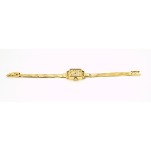 2919 - A LADIES CONSUL WATCHmade in 18ct gold with mesh strap stamped 750. the case is 1.6cm, the strap len... 