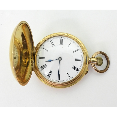 2926 - AN 18CT GOLD FOB WATCHwith classic white enamel dial with black Roman numeral with blued steel hands... 