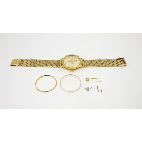 2929 - AN OMEGA SEAMASTER AUTOMATICthe monocoque case is in 18ct gold, the dial is silvered with gold baton... 