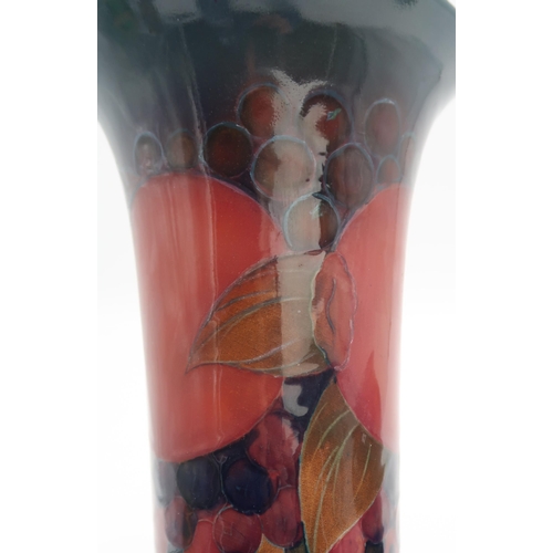 2159A - A MOORCROFT POMEGRANATE PATTERN VASEof flaring form, with impressed and green signature to base, 27c... 