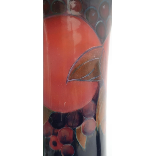 2159A - A MOORCROFT POMEGRANATE PATTERN VASEof flaring form, with impressed and green signature to base, 27c... 