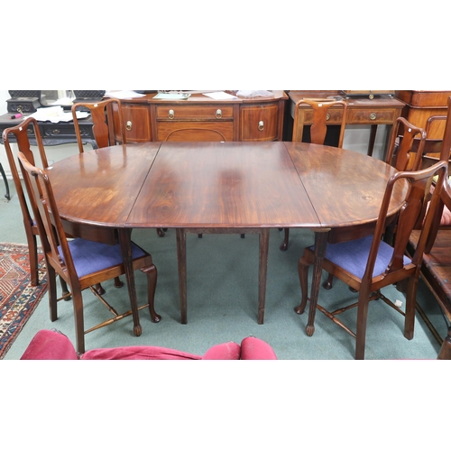 25 - A Georgian mahogany D end dining table with two D end tables joined by central table with two spare ... 