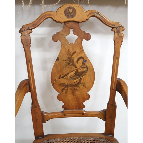 42 - A Victorian walnut framed bergere children's high chair with shaped splat inlaid with game bird over... 