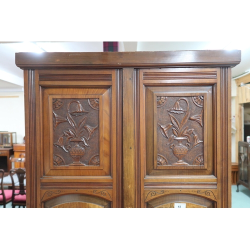 43 - A Victorian mahogany and burr walnut veneered hall robe with two panel doors over two long drawers o... 