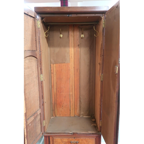 43 - A Victorian mahogany and burr walnut veneered hall robe with two panel doors over two long drawers o... 