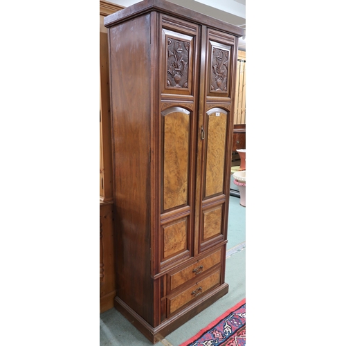 43 - A Victorian mahogany and burr walnut veneered hall robe with two panel doors over two long drawers o... 