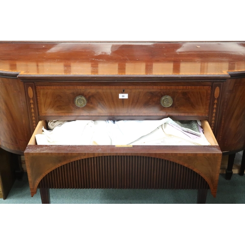 59 - A 19th century mahogany sideboard with central long drawers flanked by bowed cabinet doors on square... 