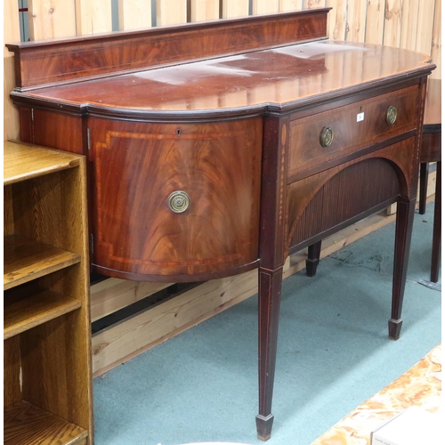 59 - A 19th century mahogany sideboard with central long drawers flanked by bowed cabinet doors on square... 