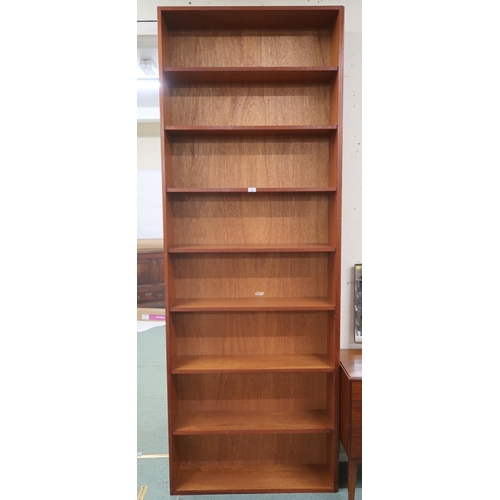 74 - A large 20th century teak open bookcase with seven fixed shelves, 244cm high x 89cm wide x 26cm deep... 