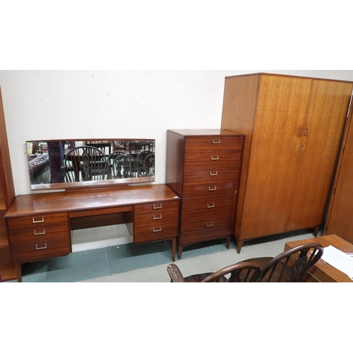 75 - A mid 20th century teak Lebus three piece bedroom suite comprising mirror back dressing table, 118cm... 