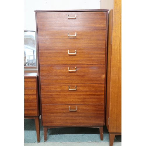 75 - A mid 20th century teak Lebus three piece bedroom suite comprising mirror back dressing table, 118cm... 