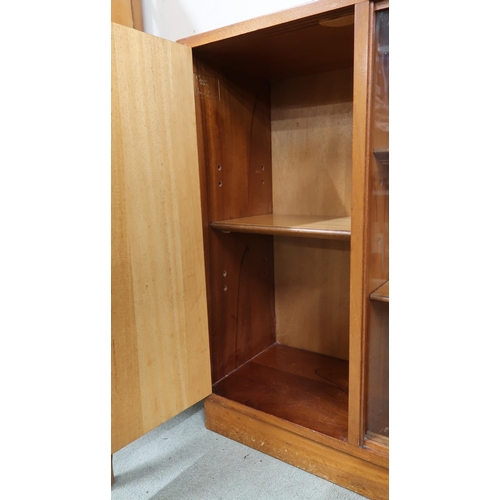 77 - A mid 20th century Morris of Glasgow bookcase with pair of central glazed sliding doors flanked by c... 