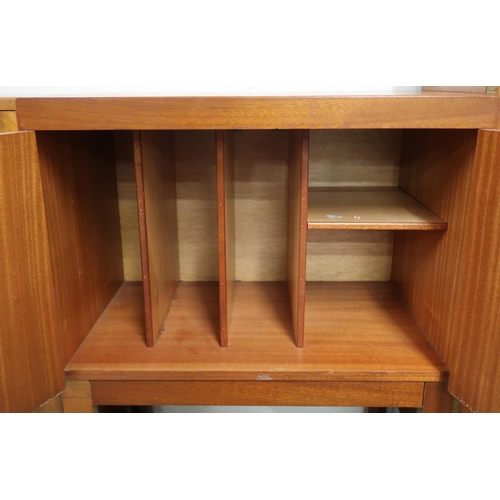 78 - A mid 20th century teak Remploy record cabinet with two doors on shaped supports, 78cm high x 60cm w... 