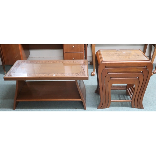 88 - A lot comprising 20th century Oriental hardwood nest of four tables with carved tops under glass on ... 