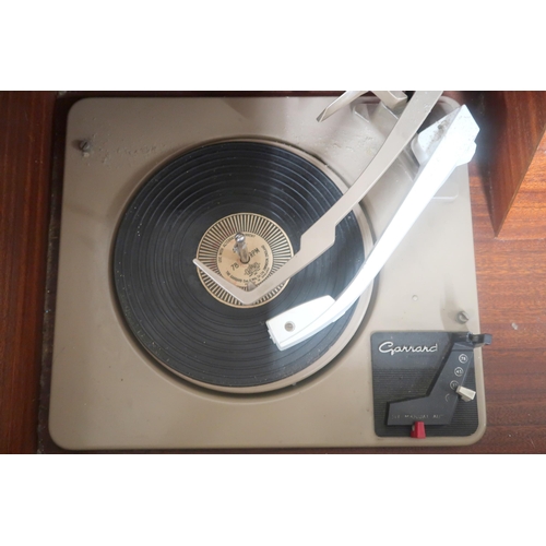 51 - A mid 20th century PYE radiogram with Garrard turntable, 76cm high x 161cm wide x 51cm deep