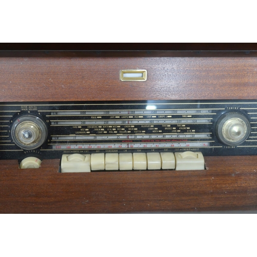 51 - A mid 20th century PYE radiogram with Garrard turntable, 76cm high x 161cm wide x 51cm deep