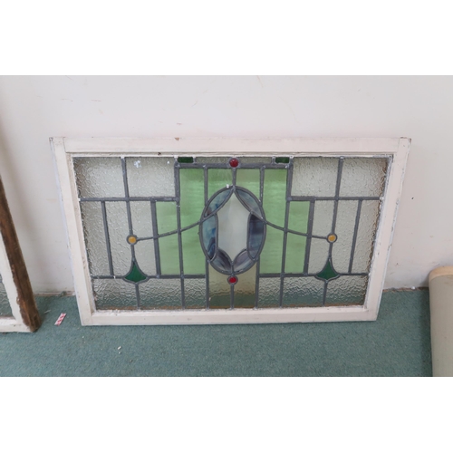 91 - A lot of two stained glass window the larger being 103cm high x 91cm wide and the smaller 55cm high ... 