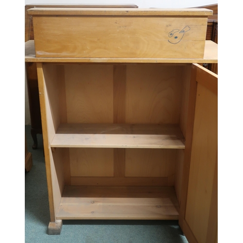 92 - An early 20th century white oak school teachers desk with hinged top writing slope over single cabin... 