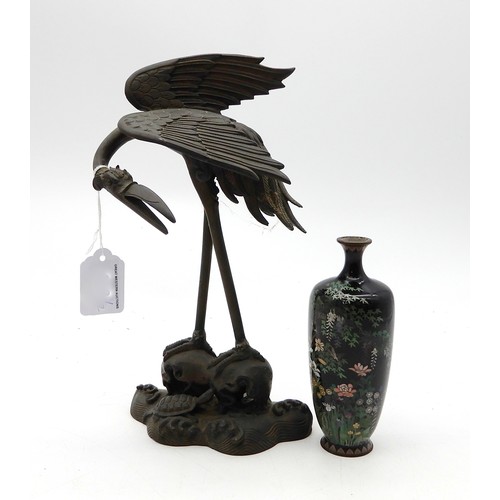 2371A - A Japanese bronze model of a crane, modelled standing on a wavy outcrop with a turtle, Meiji period ... 