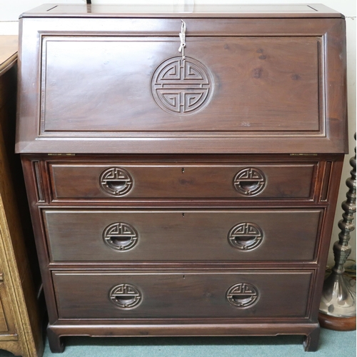 100 - A 20th century Chinese hardwood bureau with fall front writing compartment over three drawers, 110cm... 