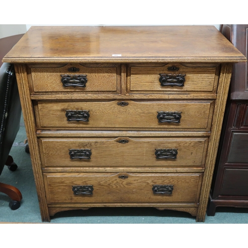 101 - A late Victorian oak Arts & Crafts two over three chest of drawers, 101cm high x 102cm wide x 52... 