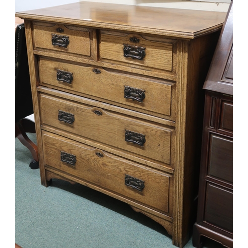 101 - A late Victorian oak Arts & Crafts two over three chest of drawers, 101cm high x 102cm wide x 52... 