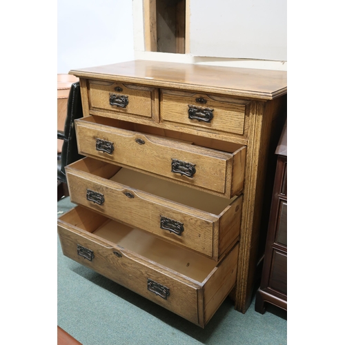 101 - A late Victorian oak Arts & Crafts two over three chest of drawers, 101cm high x 102cm wide x 52... 