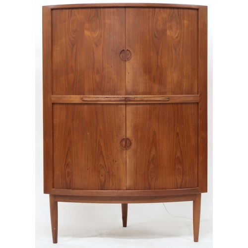 2105A - A MID 20TH CENTURY DANISH TEAK JOHANNES ANDERSEN BOW TAMBOUR FRONTED CORNER DRINKS CABINET with... 