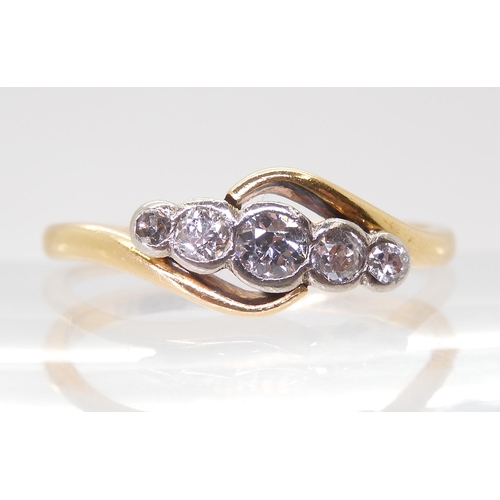 716 - A vintage five stone diamond ring set in 18ct yellow gold and platinum, the five diamonds are estima... 