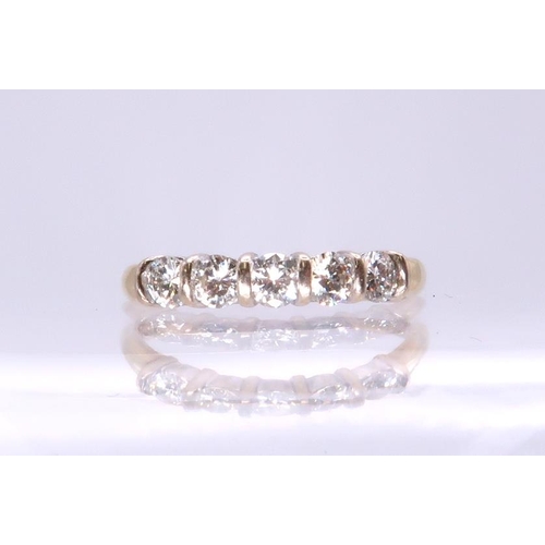 725 - An 18ct gold five  stone diamond ring, set with estimated approx 0.75cts of brilliant cut diamonds, ... 