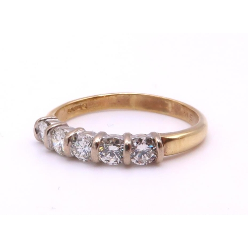 725 - An 18ct gold five  stone diamond ring, set with estimated approx 0.75cts of brilliant cut diamonds, ... 