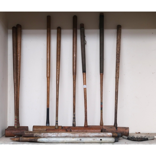 11 - A lot of nine assorted croquet mallets, associated pieces etc 