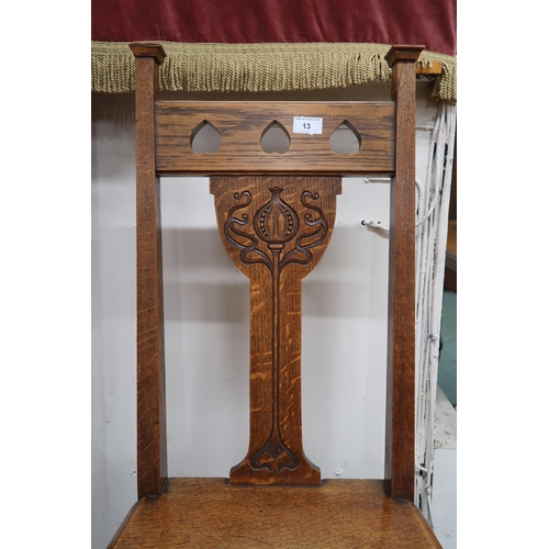 13 - A pair of early 20th century oak Arts and Crafts chairs with carved pierced back rests on square tap... 