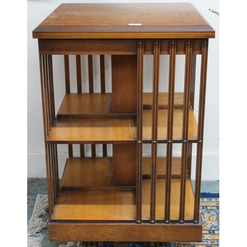 17 - An Edwardian burr walnut and mahogany two tier revolving bookcase, 85cm high x 55cm wide x 55cm deep... 