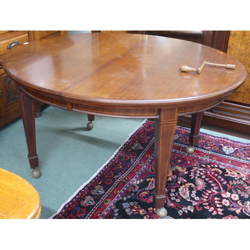 33 - A Victorian mahogany oval wind out extending dining table on square tapering supports, 75cm hig... 