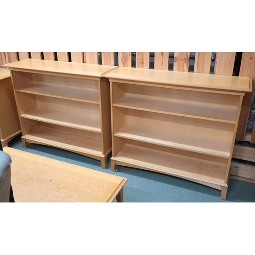 83 - A pair of Northcroft contemporary teak and birdseye maple veneered open bookcases, 91cm high x 106cm... 