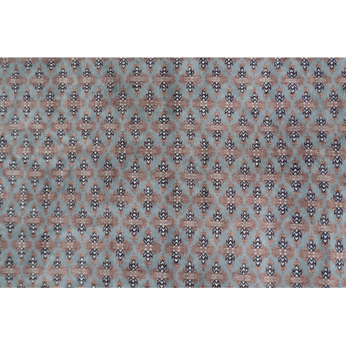 49 - A light blue ground Bokhara rug with all-over patterned ground with multicoloured border, 390cm long... 