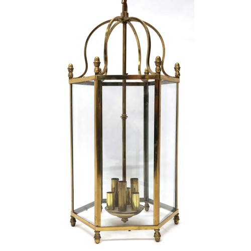 2009 - AN EARLY 20TH CENTURY VAUGHAN REPRODUCTION BRASS HEXAGONAL HALLWAY LANTERN with scroll top suspendin... 