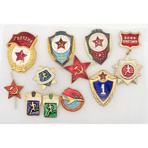 405 - Soviet memorabilia: a collection of enamel pins, comprising 10 political examples, 35 space programm... 