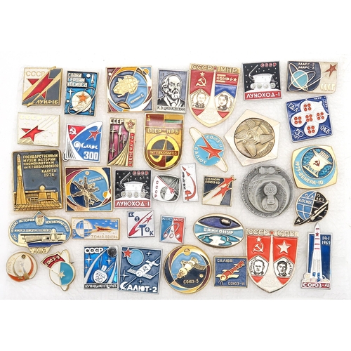 405 - Soviet memorabilia: a collection of enamel pins, comprising 10 political examples, 35 space programm... 