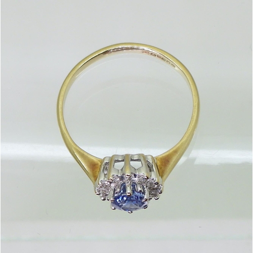 701 - A 9ct gold sapphire and diamond cluster ring, finger size J, weight 1.5gms