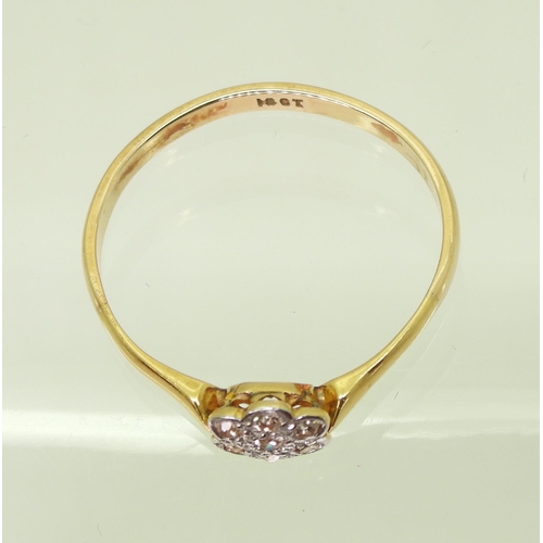 709 - An 18ct gold diamond flower ring set with estimated approx 0.15cts of eight cut diamonds, finger siz... 