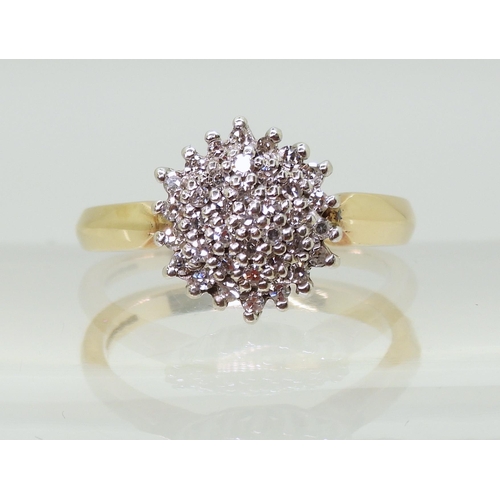 721 - A 9ct gold diamond cluster ring, set with estimated approx 0.20cts of brilliant cut diamonds, finger... 