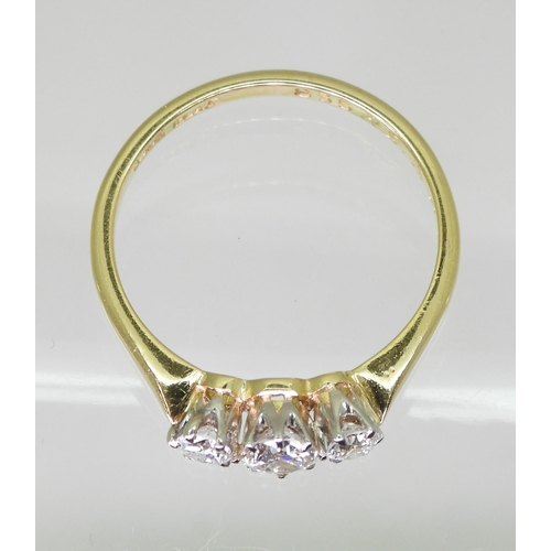 727 - An 18ct gold and platinum classic three stone ring, set with estimated approx 0.50cts in total. fing... 