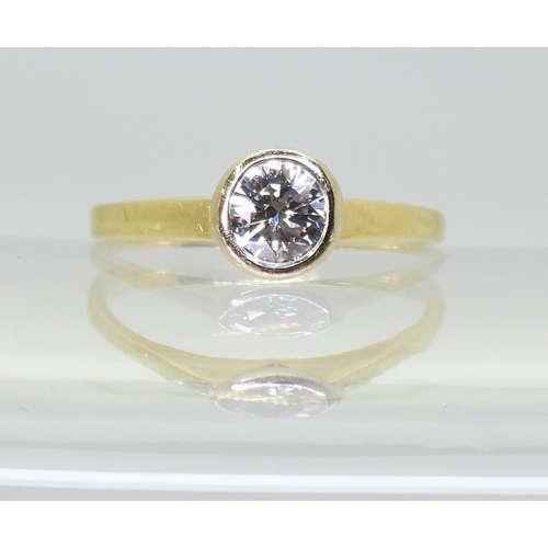 730 - An 18ct gold diamond solitaire ring, set with an estimated approx 0.50ct brilliant cut diamond in a ... 